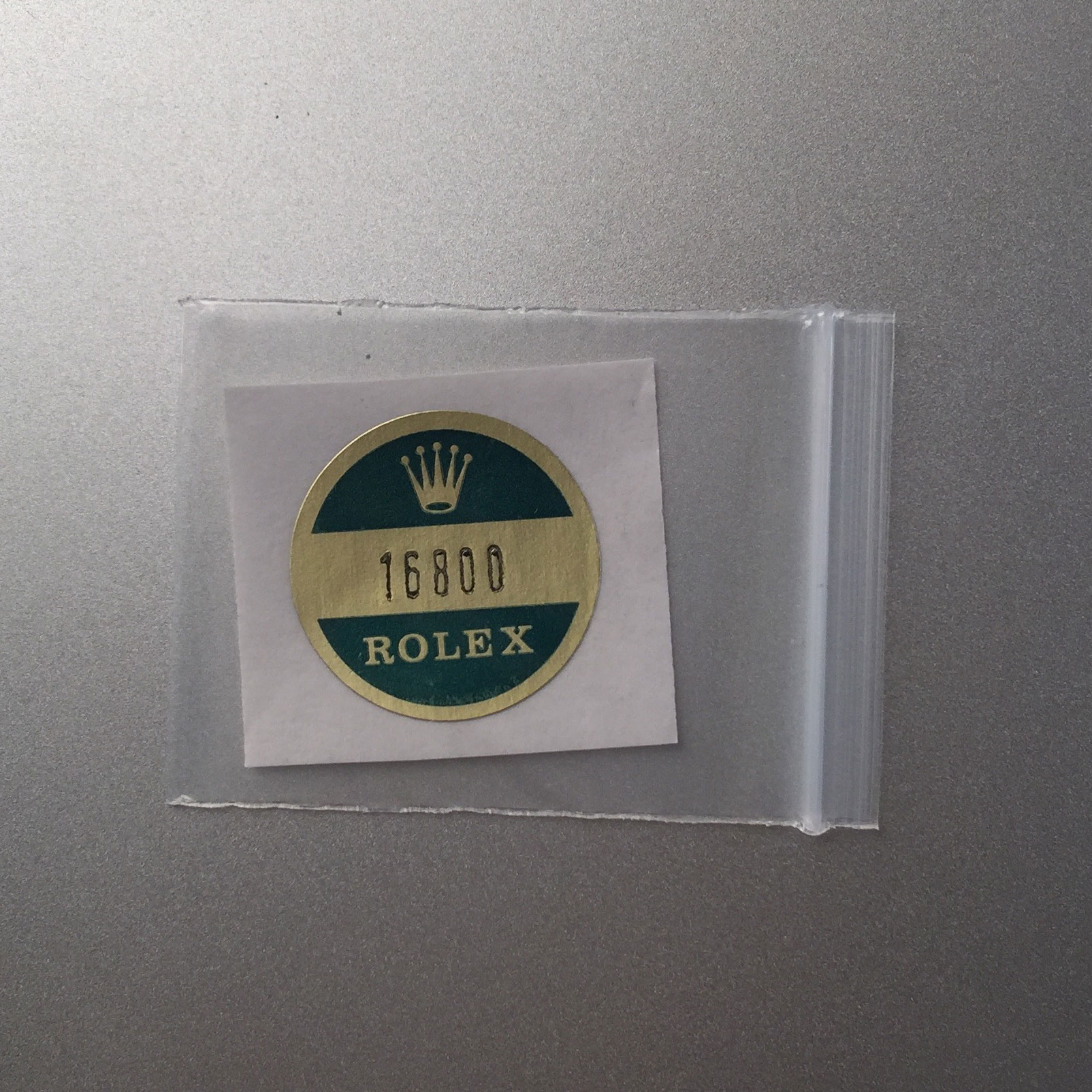 sticker on back of rolex