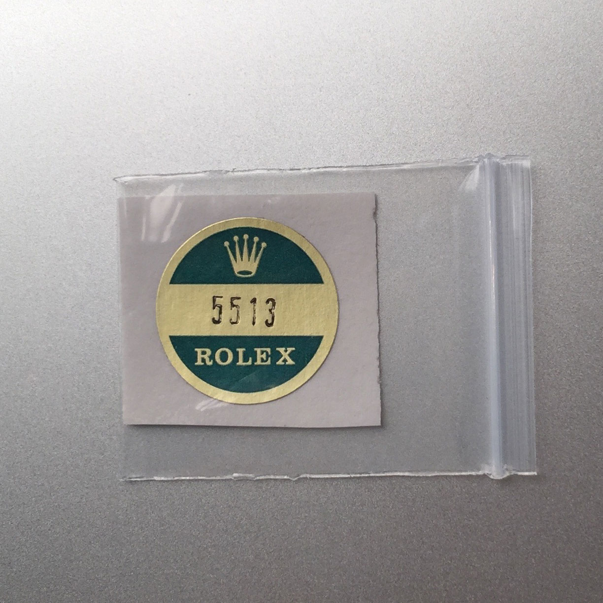 sticker on back of rolex