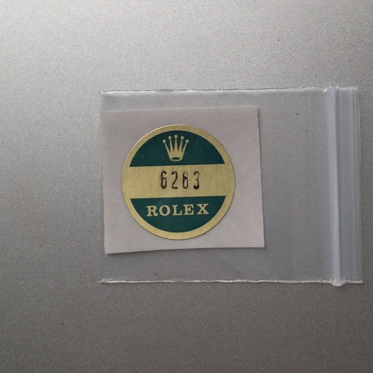 sticker on back of rolex